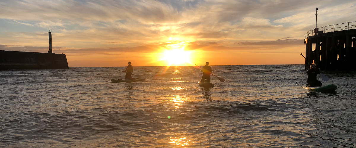 sunset paddelboard tour ocean sea